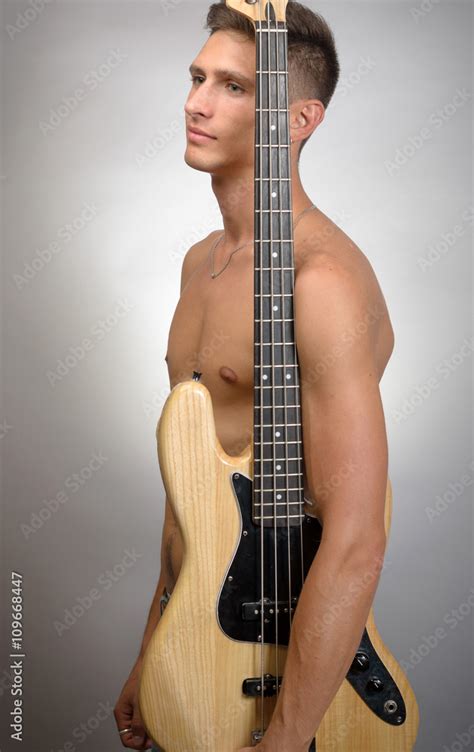 Naked Man With Bass Guitar Stock Photo Adobe Stock