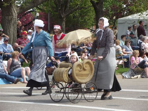 went through photos to put more Pella Tulip Festival with the parade so ...