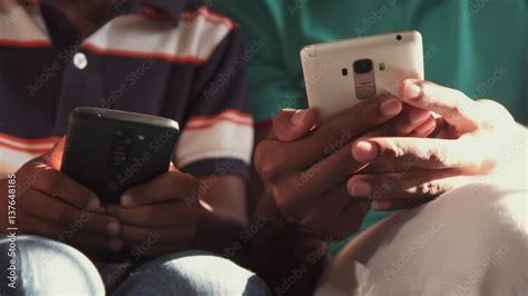 Close-up Of Black Male Hands Holding Mobile Phone Telephone Smartphone Stock Video | Adobe Stock