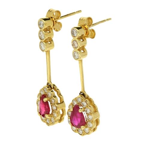 18ct Yellow Gold Diamond And Ruby Drop Earrings Miltons Diamonds