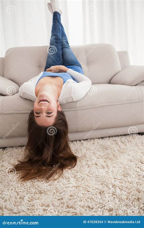 Pretty Brunette Lying Upside Down On Couch Stock Photo Image Of