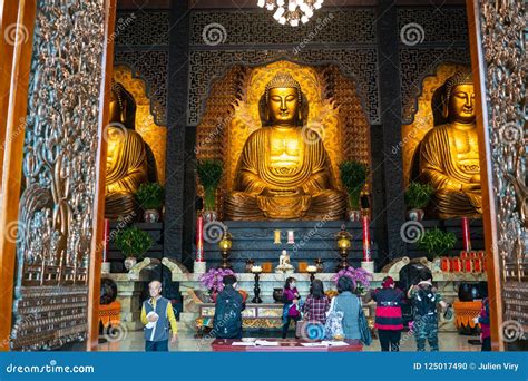 Three Buddha And People Praying At Main Shrine Of Sangha Fo Guang Shan