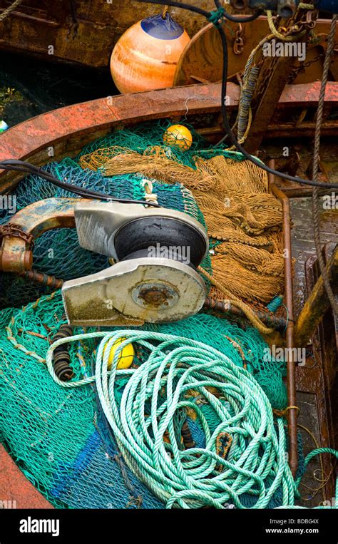 Fisherman With Nets On Stern Of Trawler Hi Res Stock Photography And