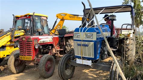 New Jcb Dx Backhoe Loader Machine Loading Mud In Mahindra Di