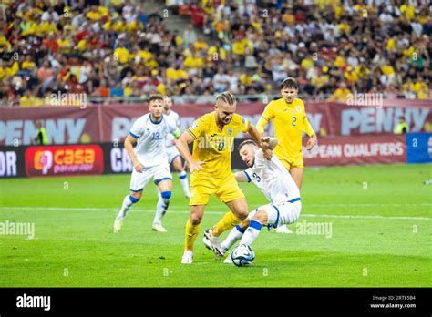 George Puscas Of Romania And Fidan Aliti Of Kosovo During The Uefa Euro