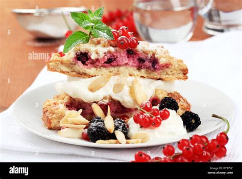 Berry fruit cake with sweet cream cheese Stock Photo - Alamy