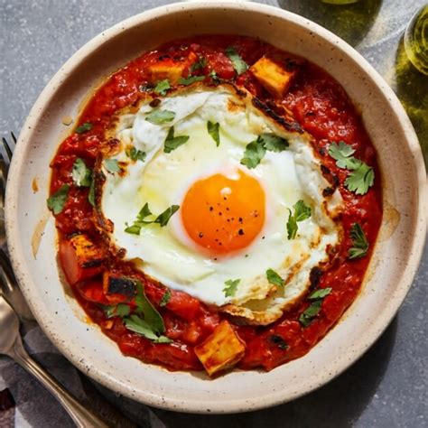 Premium Photo Photo Shakshuka Made Of Poached Eggs In Tomato Pepper Sauce