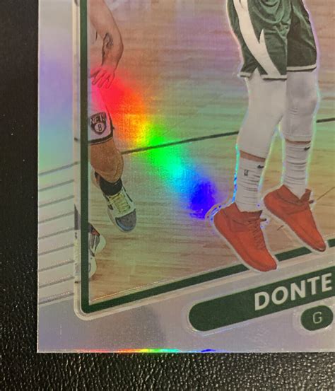 Donte Divincenzo Donruss Optic Silver Holo Prizm Bucks