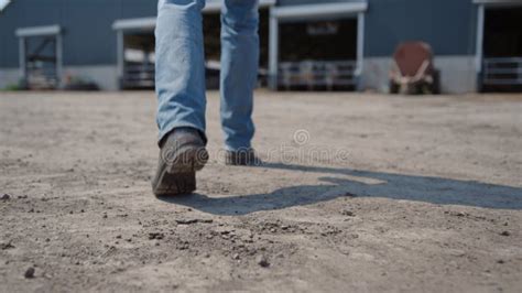 Feet In Farm Boots Walk Across A Plowed Field At Sunset Ai Generated Stock Image Image Of