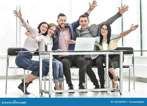 Happy Employee At Desk