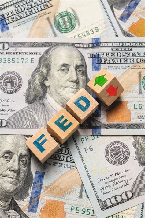 Wooden Cubes With Fed And Up Down Arrows Over 100 Usd Fed Rate Hike