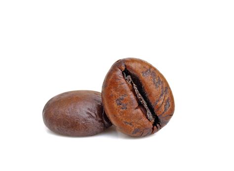 Premium Photo Close Up Two Roasted Coffee Beans Isolated