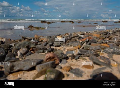 A Beautiful View Of The Jetty Rocks In A Beach In Normandy France