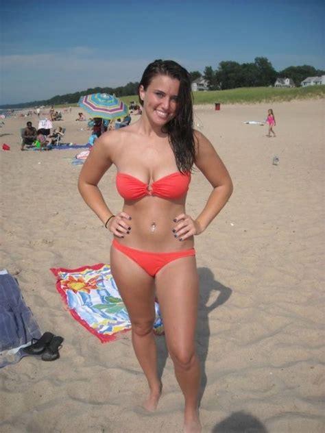 Busty Brunette At The Beach Scrolller
