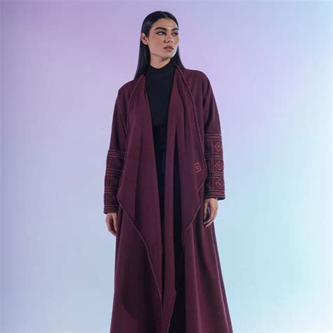 An Abaya With A Mixture Of Wool And Velvet Materials Decorated With