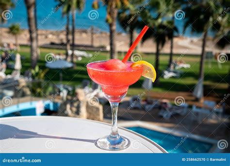 Colourful Cold Strawberry Daiquiri Cocktail Drink Served In Glass At