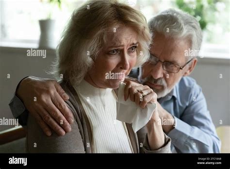 Supportive Mature Grey Haired Husband Comforting Soothing Crying Senior Wife Stock Photo Alamy