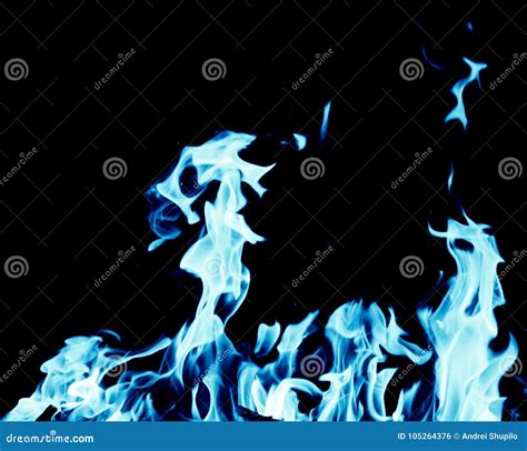 Abstract Background Of Blue Flame Fire On Black Background Stock Photo