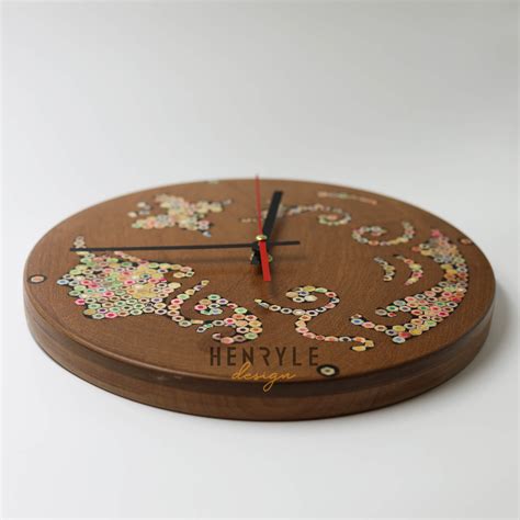 Urania Muse Colored Pencil Wood Wall Clock Henry Le Design