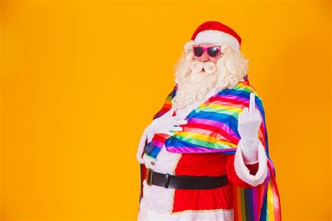Premium Photo Gay Santa Claus Holding The Lgbt Flag Christmas Gay Pride Concept Gay Santa