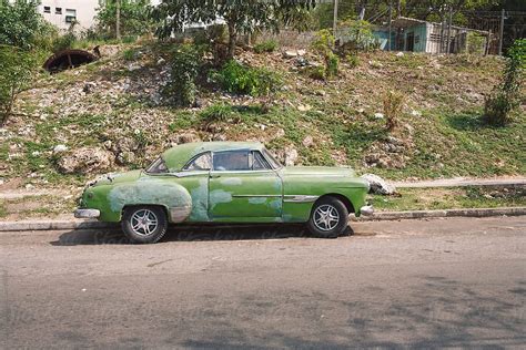 "Green Vintage Car" by Stocksy Contributor "Gabriel Tichy" - Stocksy