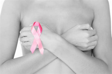 Premium Photo Health And Medicine Concept Naked Woman With Breast Cancer Awareness Ribbon
