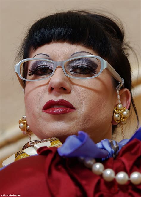 Lusty Mature Teacher In Glasses Exposing Her Boobs And Ass For A Guy