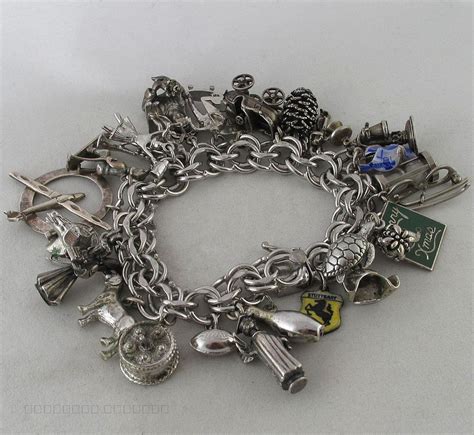 Vintage Sterling Silver Charm Bracelet With 27 Charms Including