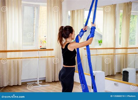 Young Gymnast Woman Doing Gymnastics on Rope in Aerial Fitness Gym Stock Photo - Image of ...