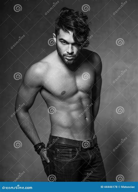 Fashion Man Model Top Naked Posing Dramatic Against Grunge Wall Stock