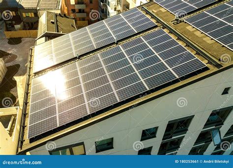 Aerial View Of Solar Photovoltaic Panels On A Roof Top Of Residential