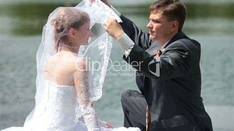 Groom Lifts Veil From Face Of Bride Lizenzfreie Stock Videos Und Clips