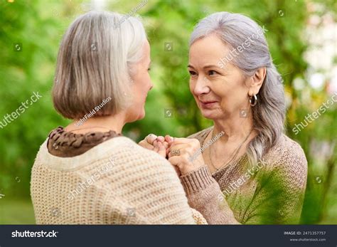 Lesbian Couple Holds Hands Smiles Each Stock Photo 2471357757 Shutterstock