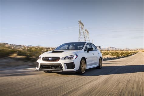 Subaru WRX STi Bears Its Golden Wheels On The Nurburgring