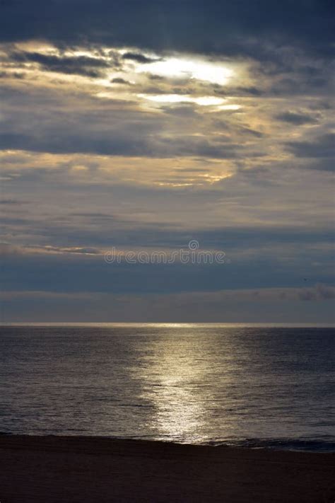 Early Morning Beach Walk At Sunrise With Glass Seas Stock Image Image