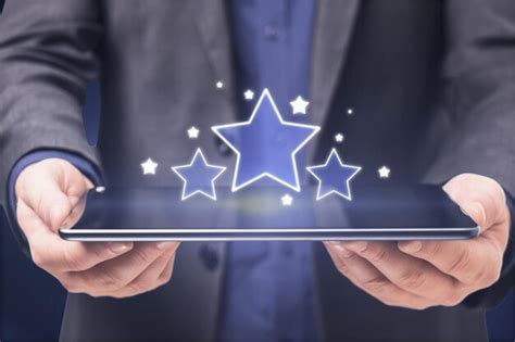 Premium Photo Businessman Hands Holding Pad With Glowing Stars On