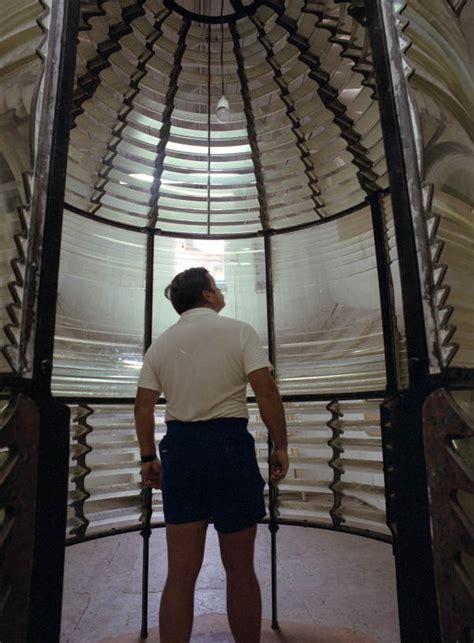 Florida Memory • Dale Mcdonald Standing Inside Fresnel Lens On Display