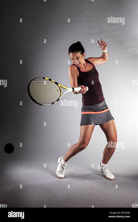 Professional Female Tennis Player Girl Swinging Racket Stock Photo Alamy