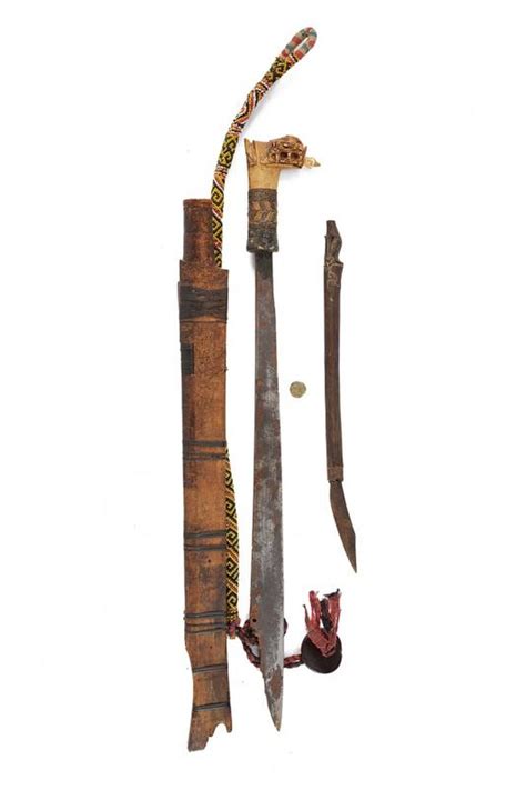 Bid Now: A Dayak mandau - December 4, 0122 10:00 AM CET