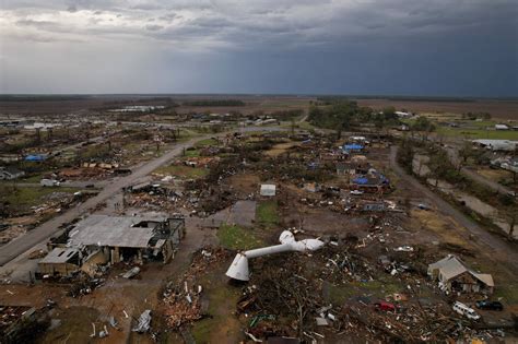 Survivors Pick Through Debris After Tornado Rips Through Mississippi