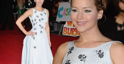 Jennifer Lawrence Puts Nude Hacking Scandal Behind Her As She Stuns In White On Mockingjay