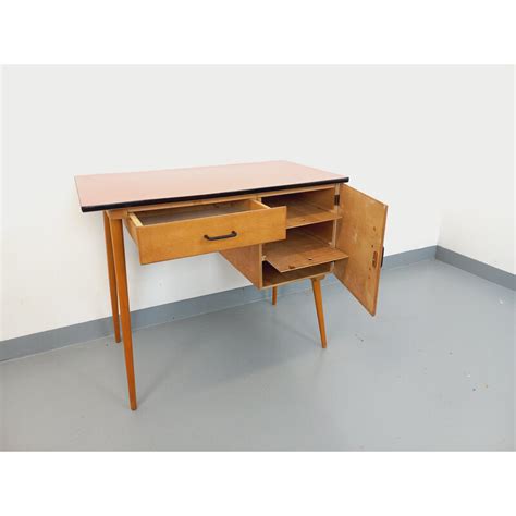 Bureau vintage Baumann en bois et formica rouge saumoné 1950