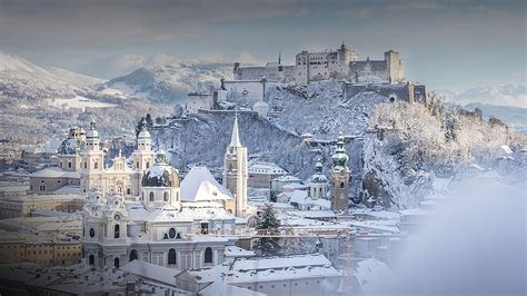 Snowy Old City And Fortress Of Salzburg At Winter Sunny Day Austria