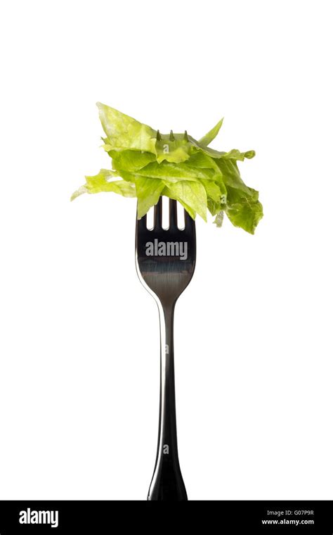 Fork and salad Stock Photo - Alamy