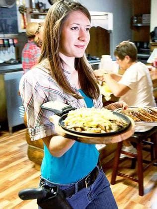 Waitresses at Shooters Grill in Rifle, Colorado carry guns