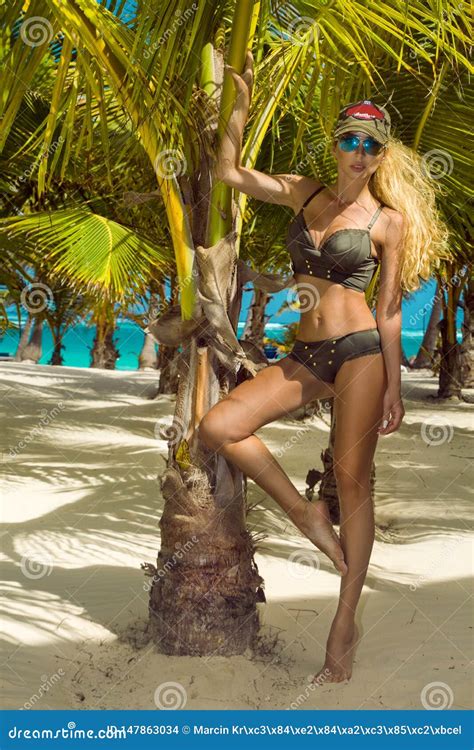 Beautiful Bikini Woman Posing On The Caribbean Beach Stock Photo