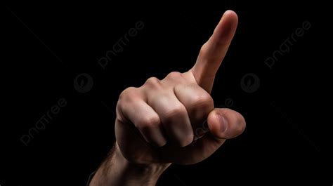 Person Finger Pointing On A Black Background Picture Of A Big Middle