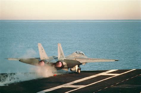 A Fighter Squadron 14 VF 14 F 14A Tomcat Aircraft Is Launched From