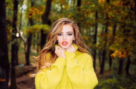Beautiful Autumn Woman With Autumn Leaves On Fall Nature Background Gorgeous Brunette Model