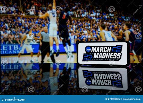 March Madness Logo On Screen And Ncaa Basketball Game Play On Tv In The